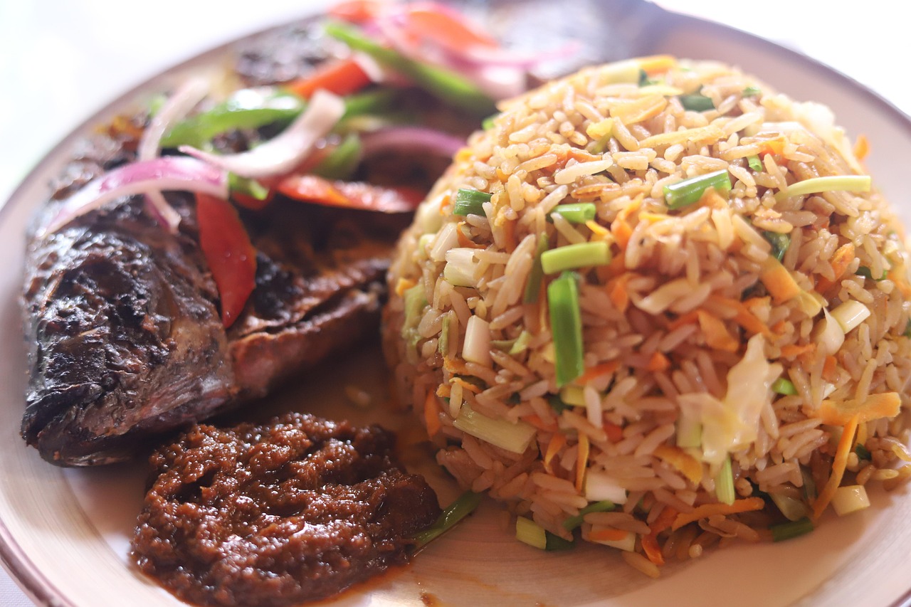 jollof, jollof rice, ghanaian dishes, rice and tilapia, jollof rice and tilapia, grilled tilapia, rice and fish, jollof rice and fish, west african jollof rice, seasoned tilapia, jollof, jollof rice, jollof rice, jollof rice, jollof rice, jollof rice